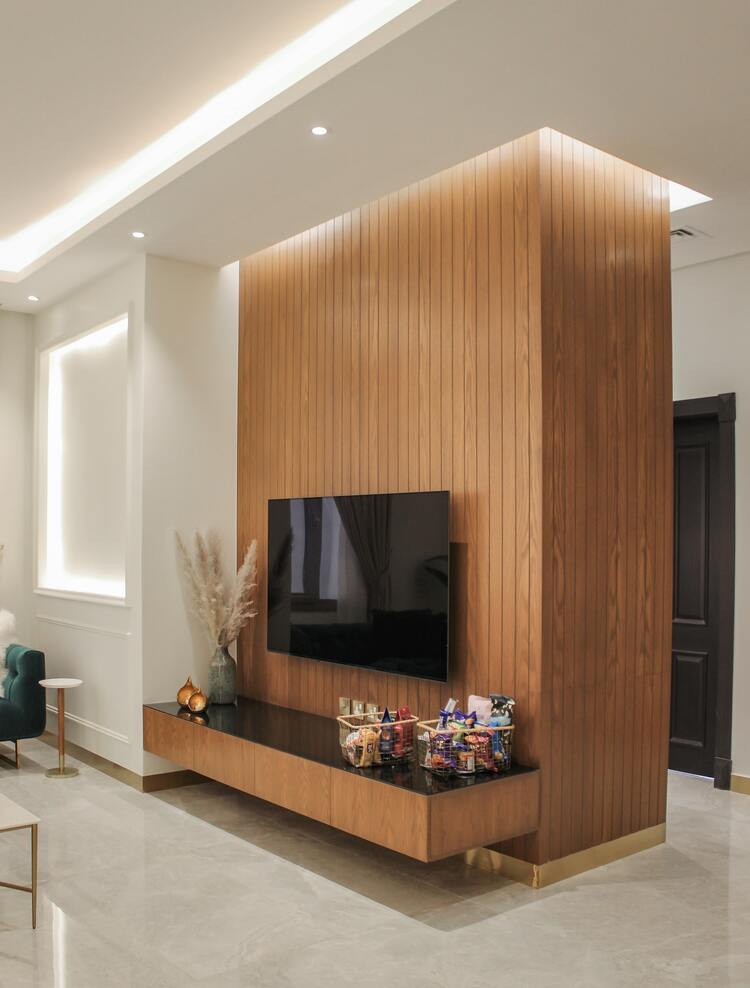 Living room with a television on an L-shaped background